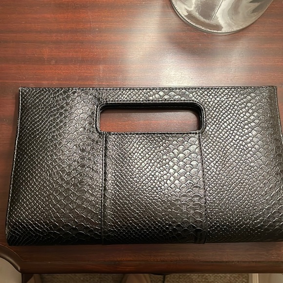 Charming Charlie Handbags - Charming Charlie’s Black Snap Shut Clutch